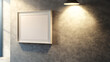 © Mariani - Minimalist interior featuring a blank frame on a textured wall illuminated by soft lighting