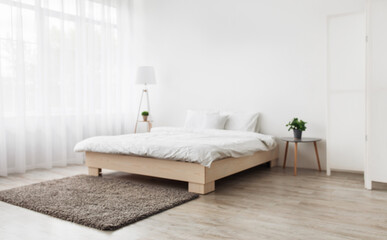 Aufkleber - Simple modern bedroom interior, contemporary minimalist design. Double bed with pillows and blanket, carpet on floor, large window with curtains, on white wall background, copy space, nobody