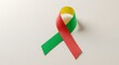 © phj.domingos - Awareness ribbon yellow green and red symbol for support and solidarity on a white background