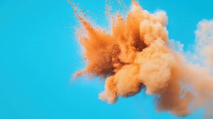 Poster - Orange Powder Explosion Against Blue Sky Background; Abstract Art; Color Burst; Studio Shot; High Angle; Conceptual Photography