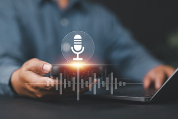 Fototapete - Voice recording concept. Mobile application, record sound and voice message. Man using smartphone with voice recording app. Use AI Enabled Internet Search for Easy Access to Information.