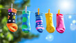 © nuttachet chinavong - Colorful socks hanging on clothesline against bright blue sky, creating cheerful and vibrant atmosphere