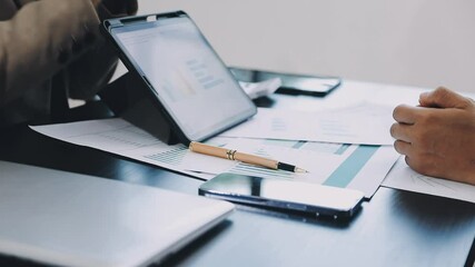 Auditor and accountant team working in office, analyze financial data and accounting record with calculator. Accounting company provide finance and taxation planning for profitable cash flow. Insight