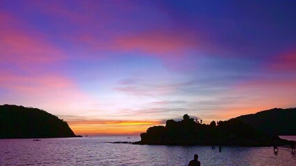 Wall Mural - stunning sunset above the island in front Yanui beach.
Yanui beach is in the middle of windtubind viewpoint and Promthep cape
small island in front of Yanui beach.
creative nature and travel concept