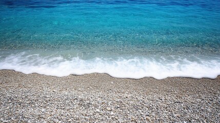 Poster - Turquoise Ocean Water Gently Lapping onto a Pebble Beach in the Mediterranean Sea from Above