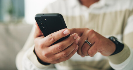 Poster - Man, hands and scroll with phone on sofa for app download, playing online game and streaming service. Closeup, relax and person with smartphone in home for social media, reading ebook or dating site