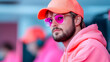 © mtsbraja - Portrait of a Young Man in Pink Hoodie and Sunglasses
