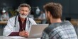 © Iyara Studio - Doctor examines a patient and records their medical history into the electronic health record system for accurate and efficient care
