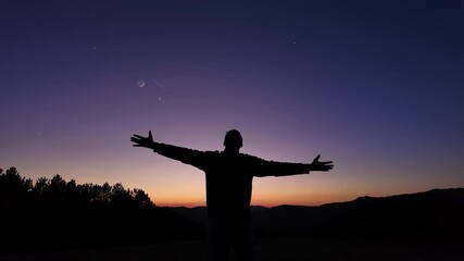 Wall Mural - silhouette of a man and countryside under the stars and moonlight.