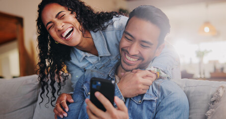 Poster - Laugh, couple and phone in home for funny video, social media and bonding together with online meme on weekend. Tech, happy man and woman in living room for joke, streaming comedy and holding hands