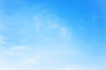 Wall Mural - fantastic soft white clouds against blue sky and copy space horizontal shape