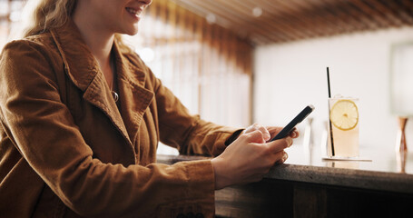 Poster - Pub, woman and smile with smartphone for chat, online communication and social media with alcohol. Restaurant, female person and customer with phone for app, text message notification and cocktail
