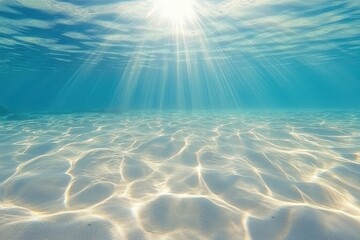 Poster - Underwater View of Sandy Seabed with Sunbeams Streaming Through Turquoise Water Serene Ocean Scene