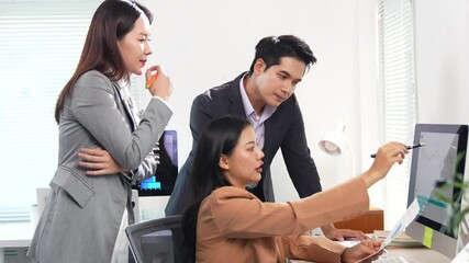 Poster - Professional business team working together, analyzing financial data displayed on computer screen and tablet, collaborating to develop effective marketing strategies for company growth and success