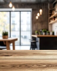 Poster - Wooden tabletop surface in focus with blurred modern kitchen and dining area background in a loft apartment setting