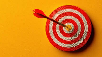 Poster - Red dart precisely hitting the center of a yellow wall symbolizing clear business goals and success