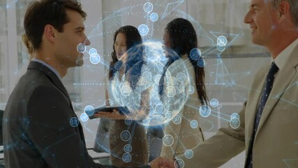 Poster - Two businessmen shaking hands in corporate room, with floating holographic globe network icons