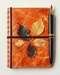 © NovaForm - Autumnal notebook with dried leaves and pen
