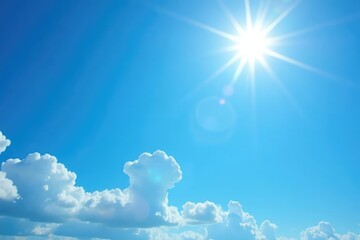 Wall Mural - Bright sun illuminates a clear blue sky, fluffy white clouds drift lazily , space, aerial