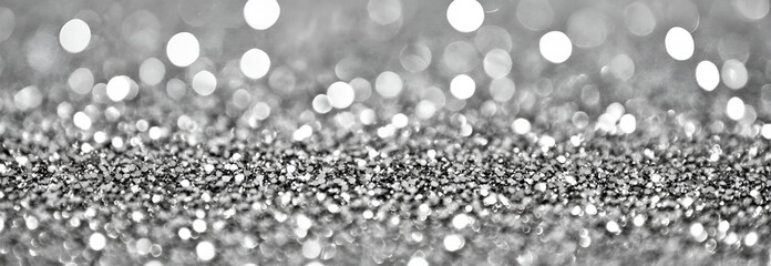 Poster - Abstract silver glitter bokeh effect texture background creating a dazzling display of light for celebrations or events