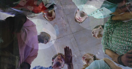 Poster - Image of statistical data processing over diverse colleagues stacking hands together at office
