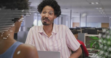 Poster - Man speaking to woman in business office, displaying digital world map graphics and laptop