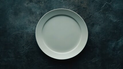 Poster - Empty white plate on dark textured surface. (1)