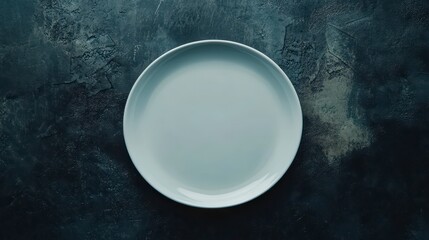 Poster - Empty white plate on dark textured surface. (2)