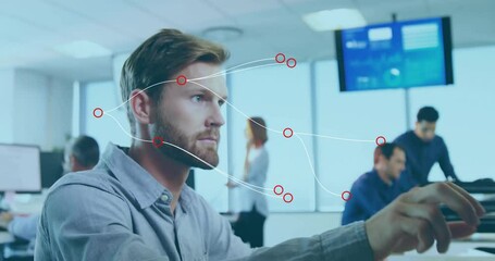 Poster - Bearded man typing at desk in business office, with animated data charts floating
