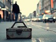 © RIkaHana - Rusty toolbox rests on city street sidewalk.