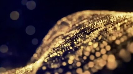 Poster - Abstract Golden Particles Flowing Against Dark Blue Background Video