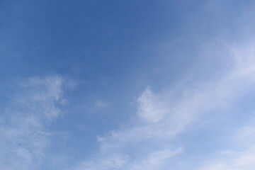 Wall Mural - beautiful blue sky and white cloud background in springtime
