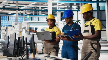 Poster - all black inspectors team in photovoltaics factory look over documents, review performance of robot 