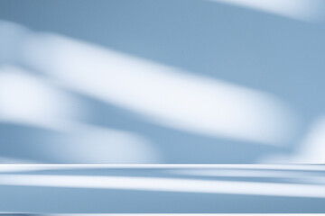 Leinwandbilder - Wall interior background, studio and backdrops show products.with shadow from window color white and blue background for text insertion and presentation product	
