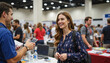 © Vera - Young entrepreneur networking at summer job fair, professional growth