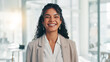 © FremtonClay/peopleimages.com - Portrait, smile and business woman in corporate office for ambition, finance or investment career at venture capital. Happy, professional employee and confident worker with private equity in Spain
