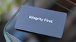 © 11 - Business Card Featuring the Phrase Integrity First on a Minimalist Background
