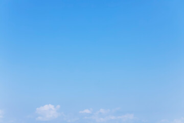 Wall Mural - fantastic soft white clouds against blue sky and copy space horizontal shape. web banner.website hea