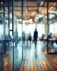 Leinwandbilder - Modern office interior with glass walls and wooden floor, people walking in background, blurred perspective, daytime