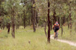 © Austockphoto - Person riding push bike on mountain bike track in the bush