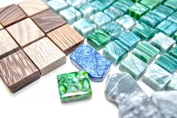 Poster - Assortment of decorative cubes featuring wood, stone, and gemstone textures in a close up