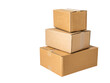 © Kookkii - Three stacked brown cardboard boxes of varying sizes.