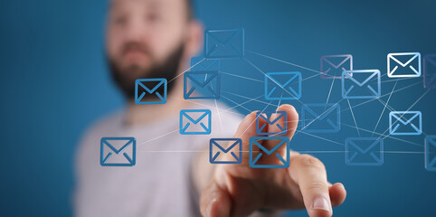 Leinwandbilder - Stock photo of a man interacting with a network of digital email icons.  Perfect for email marketing, communication, and technology concepts.