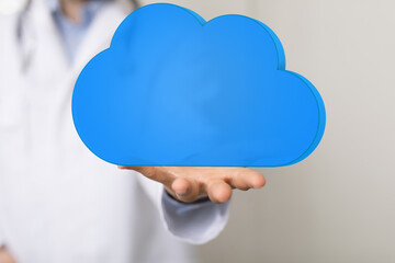 Poster - Image of a doctor presenting a cloud icon, symbolizing healthcare data storage and cloud solutions.