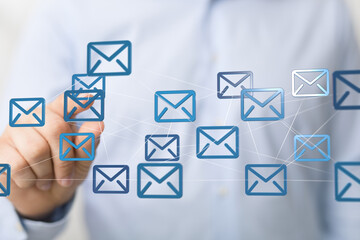 Aufkleber - Stock photo of a hand interacting with a network of email icons, representing global communication and connectivity.