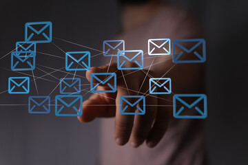 Poster - Hand pointing at digital email network.  Concept for global communication, teamwork, and connection.
