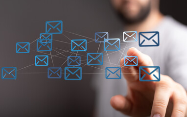 Poster - Man interacts with a digital network of email icons, representing global communication and connection.