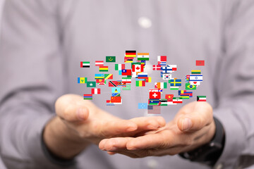 Leinwandbilder - Image of hands holding a network of international flags, symbolizing global connection and international relations.
