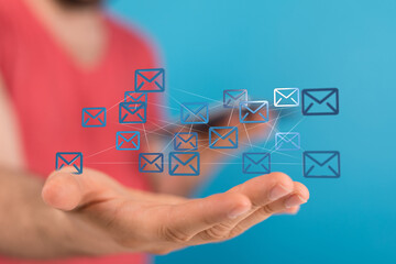 Poster - Image of a hand holding a network of email icons, representing digital communication and connection.