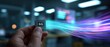 © Fernando - Hand holding 6G microchip with data stream in modern office Concept of next generation technology, wireless communication, and high speed internet